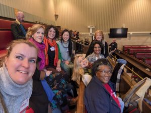 A group of women from diverse backgrounds at the Bristol City Hall full council meeting