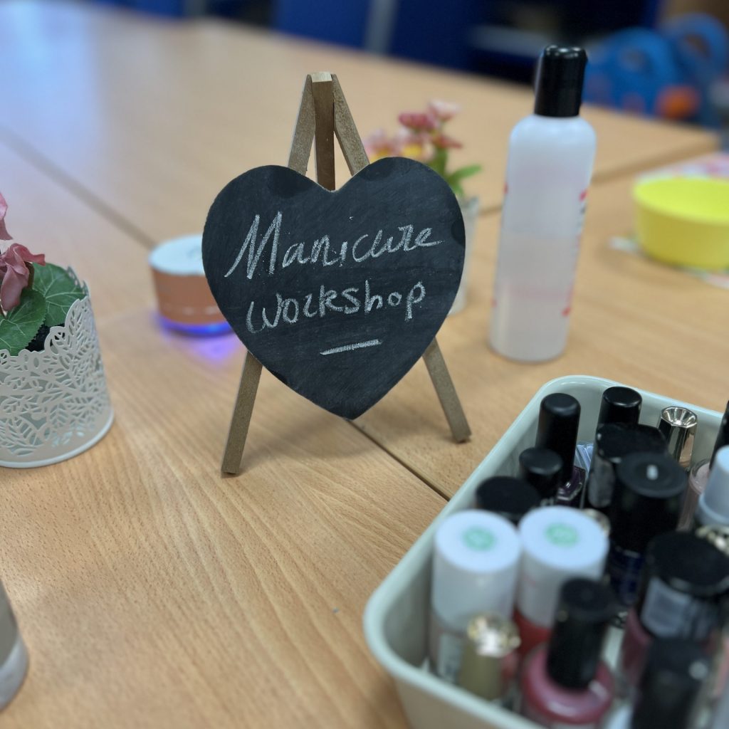 Manicure Workshop sign at Beauty of Caring Workshop